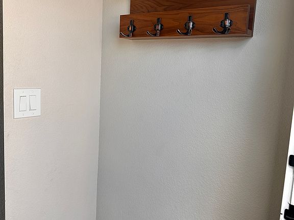 Entryway -room for coats, keys, and shoes.