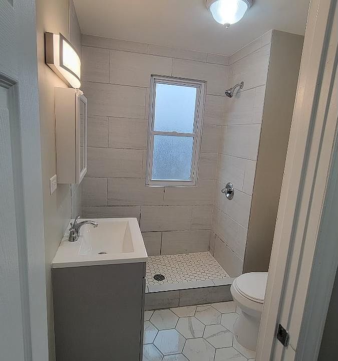 updated bathroom refinished hardwood flooring