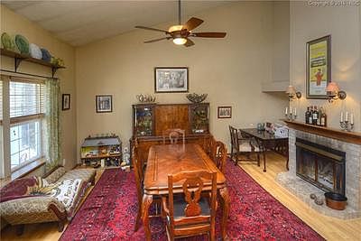 Formal Living or Dining Room with a double sided fireplace.