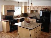Kitchen has maple cabinets, granite countertops, new appliances