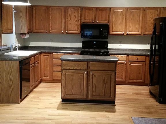 Open kitchen with island and breakfast nook