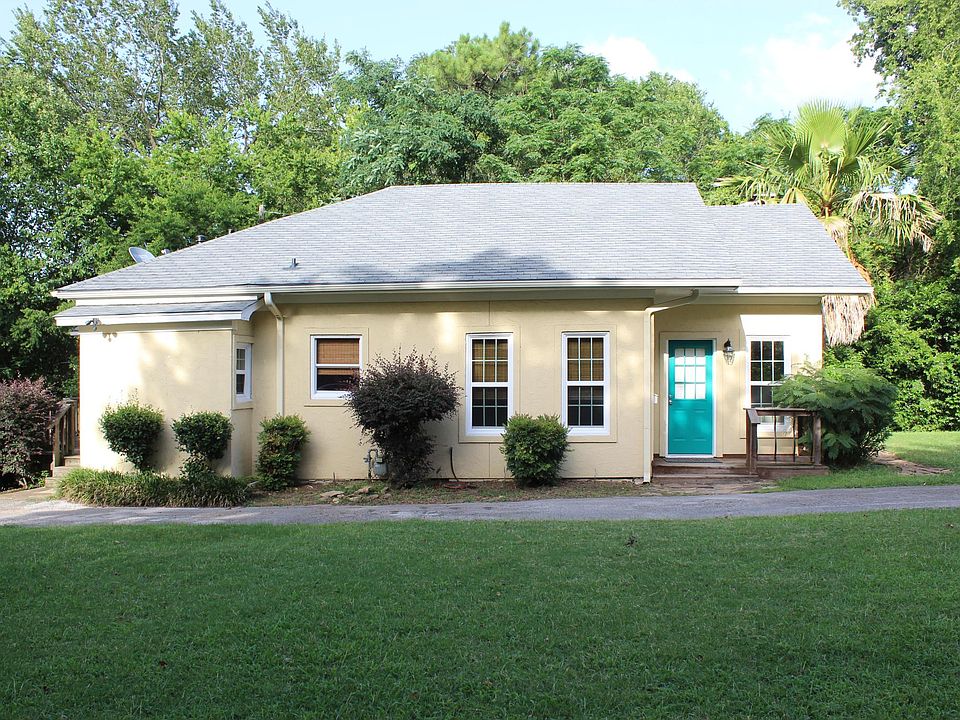 View of house with front door, porch.