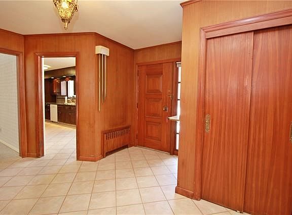 Enter into this lovely home through spacious entry foyer which leads to multiple areas of the home.