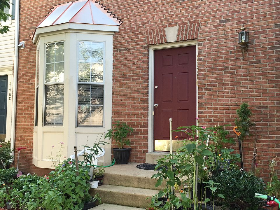 Front Door. Brick Front and Bay Window