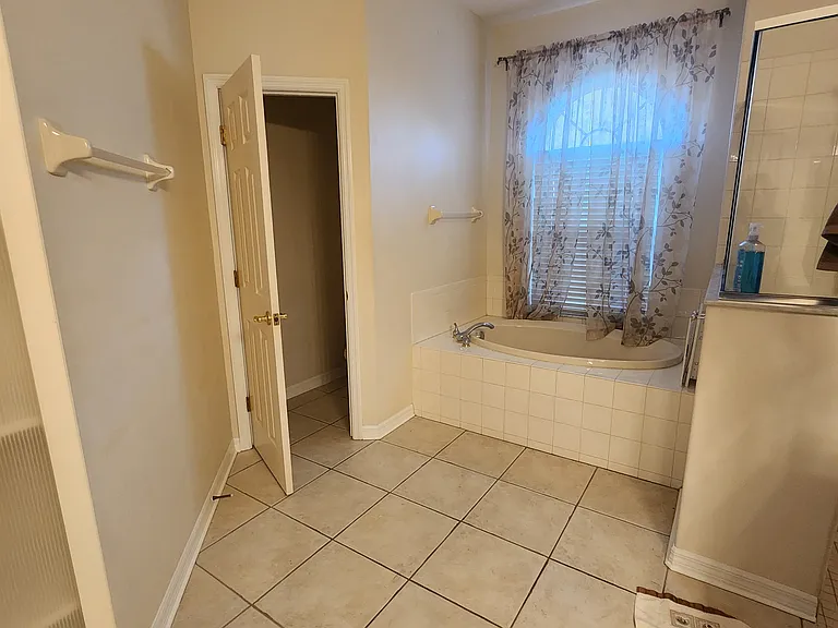 Master Bedroom Suite
Master Bathroom - soaking tub, private toilet room