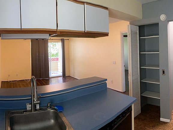 view from kitchen to living room and lanai