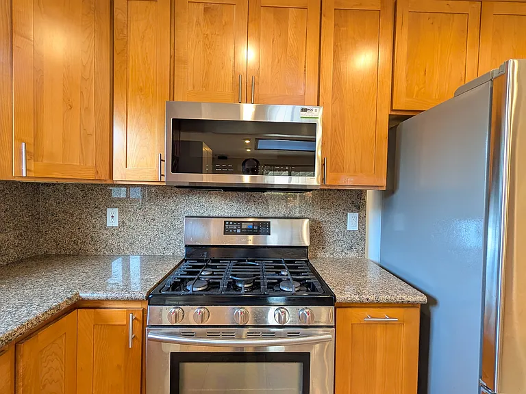 Samsung gas range and microwave.
