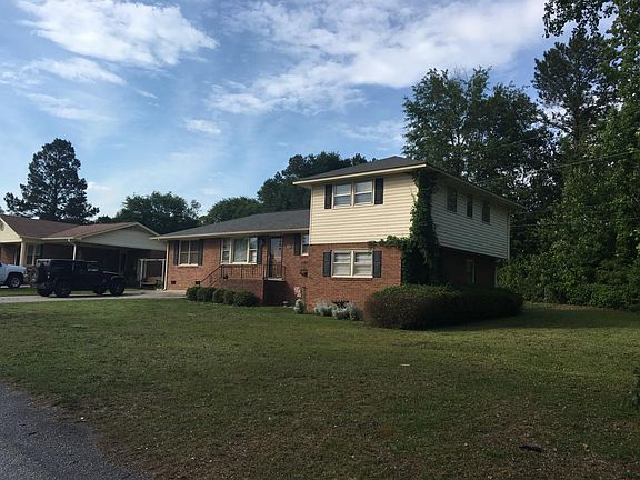 Front of house with side yard