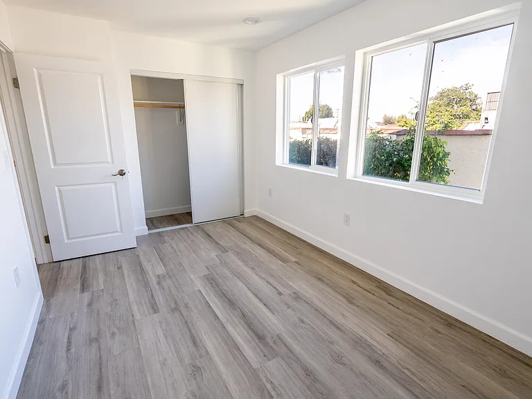 Bedrooms with good size, tons of natural light, and closet space
