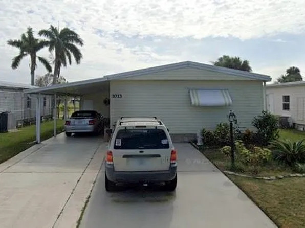 1013 Royal Palm Dr, Barefoot Bay, FL 32976