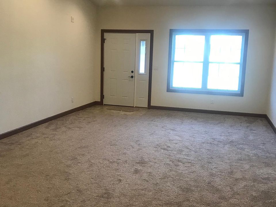 large living room with vaulted ceiling