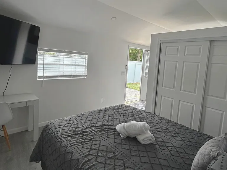 Smart TV, work desk & comfy chair for study or remote work.