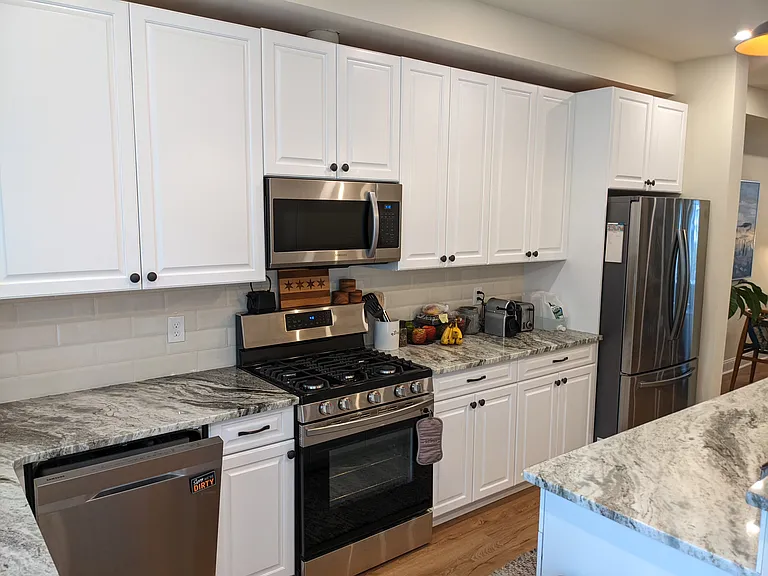 Gas Stove, French Door Fridge, Dishwasher, Custom Cabinets