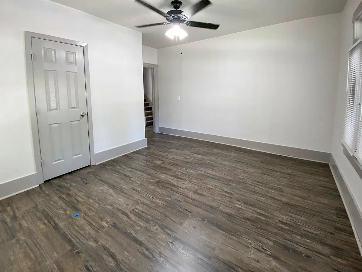 Spacious room with large windows for an abundance of natural light - Travis Ave