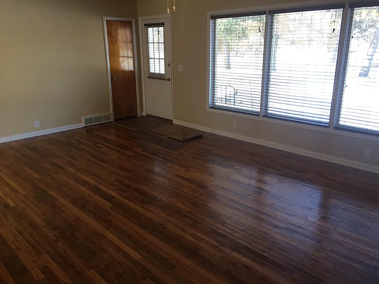 Living Room front door large windows new shades