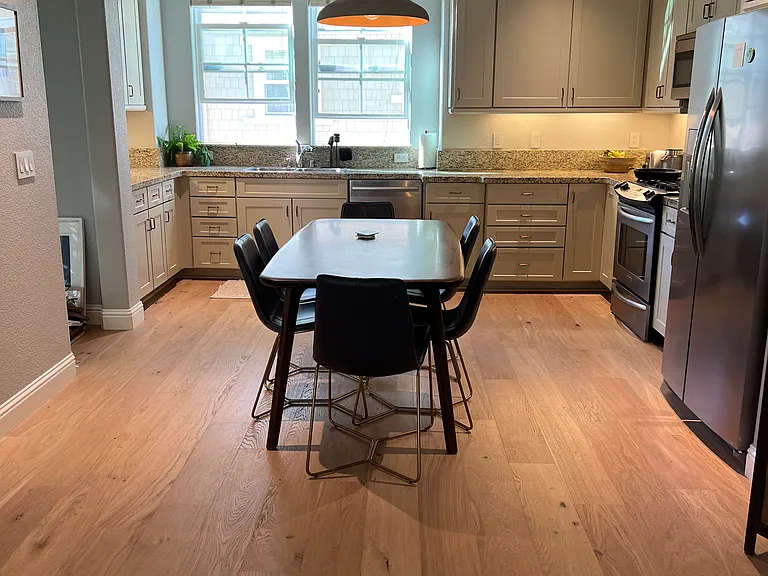 Kitchen and appliances shared between 2 tenants and owner.
