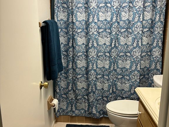 Master bath has large walk-in shower with rain shower head!