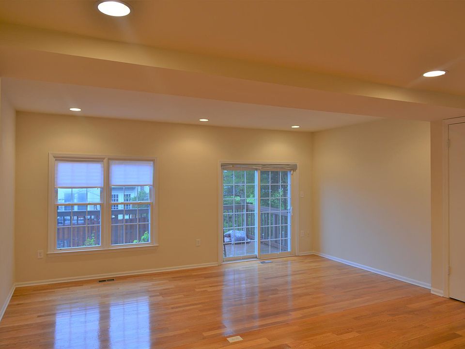 Living Room with recessed lighting (and Walk Out Deck)