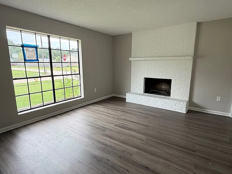 New Floors- Wood Burning Fireplace