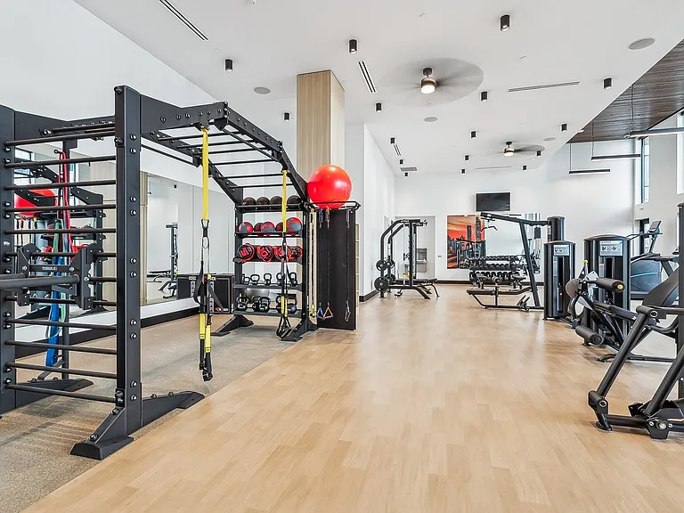 24/7 fitness center with HIIT and resistance training equipment
