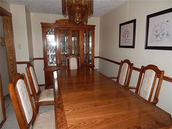 Formal dining room large enough for you dining set.
