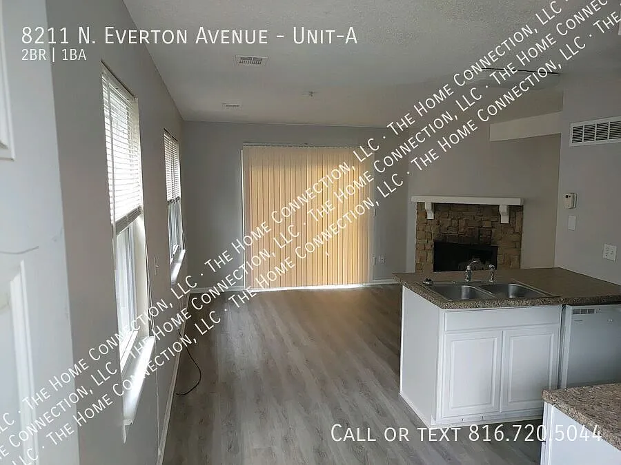 Building Photo - 8211 N Everton Ave #A