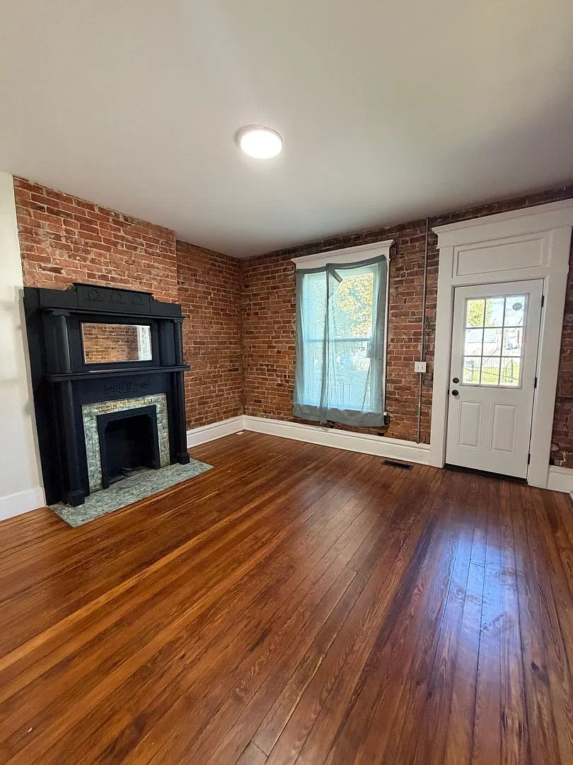 Fully Renovated 3 Bed / 2.5 Bath with Exposed Brick, New Garage & Fenced Yard — Photo 4