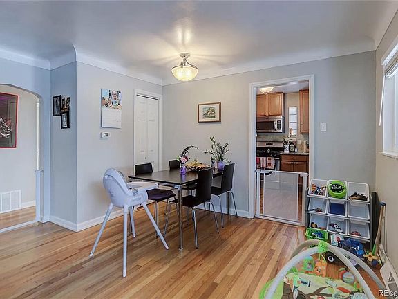 Main room dining area with coat closet.