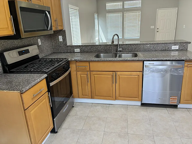 Kitchen - remodeled, brand new dishwasher and kitchen faucet. Gas Range.