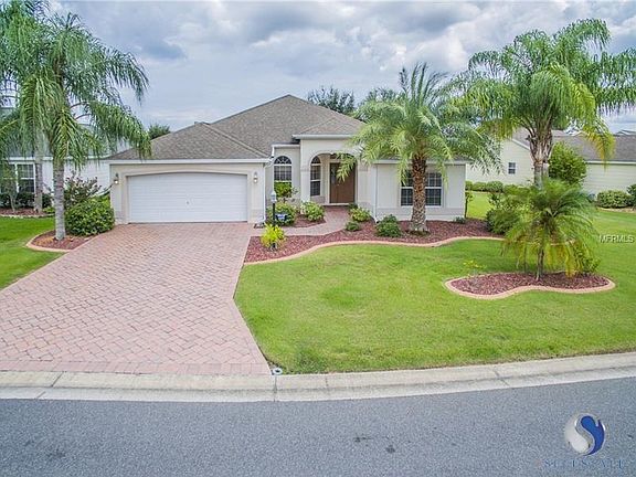 THIS CLASSY HOME IS OFFSET ON AN EXTRA LARGE LOT WITH A GORGEOUS VIEW ACROSS THE STREET AT THE CUL-DE-SAC AND GARDEN VIEW IN BACK WITH ROOM TO EXPAND IN THE BACK OR RIGHT SIDE!