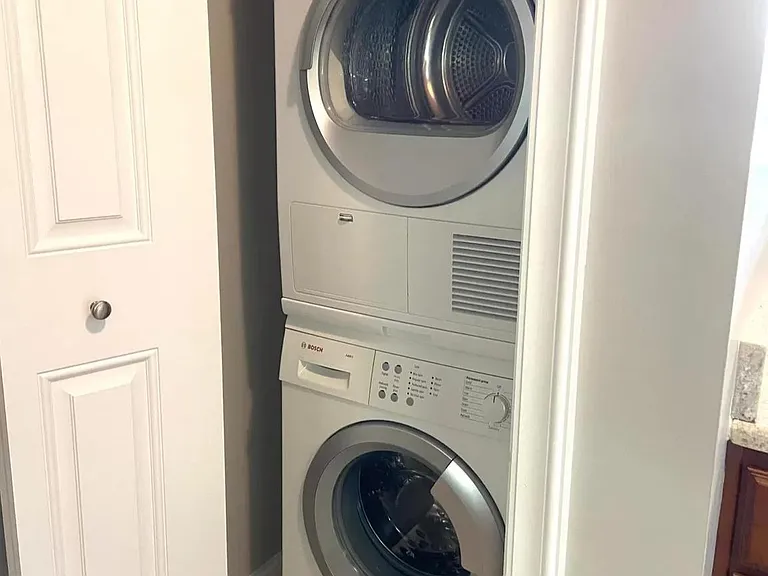 Full size, in unit, Bosch washer and dryer.