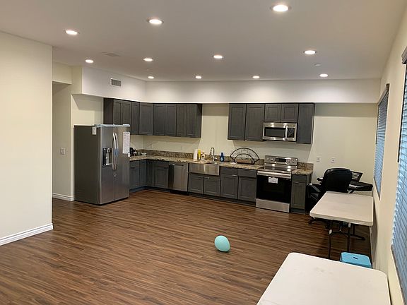 Living Room / Kitchen / Work Space Combo (over 50% of the Suite, so it qualifies as live/work and you may use as tax deduction if working from home).