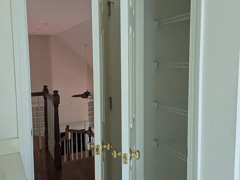2nd Floor Bathroom and linen closet.