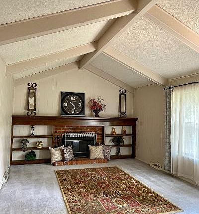 Family Room With Built-Ins and Vaulted Beamed Ceilings