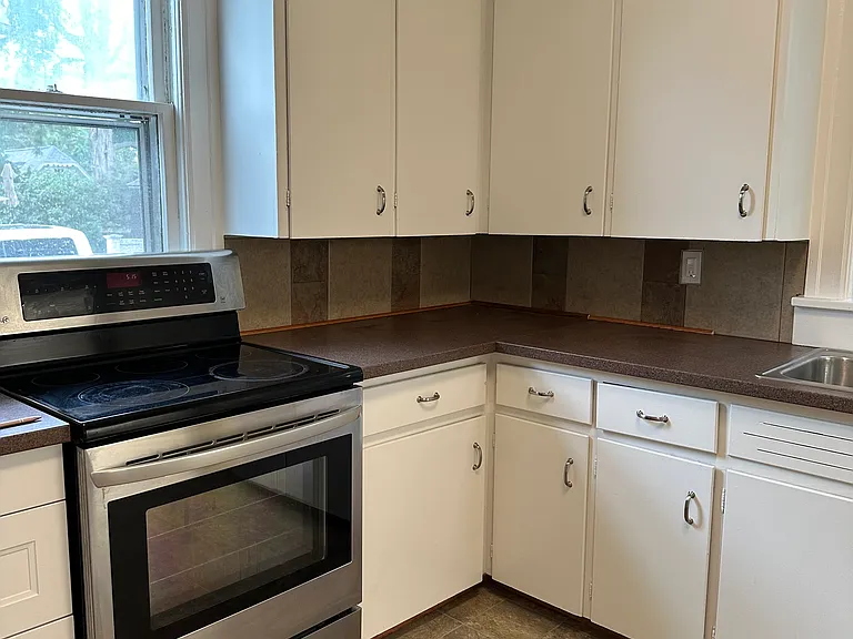 Kitchen includes self cleaning range