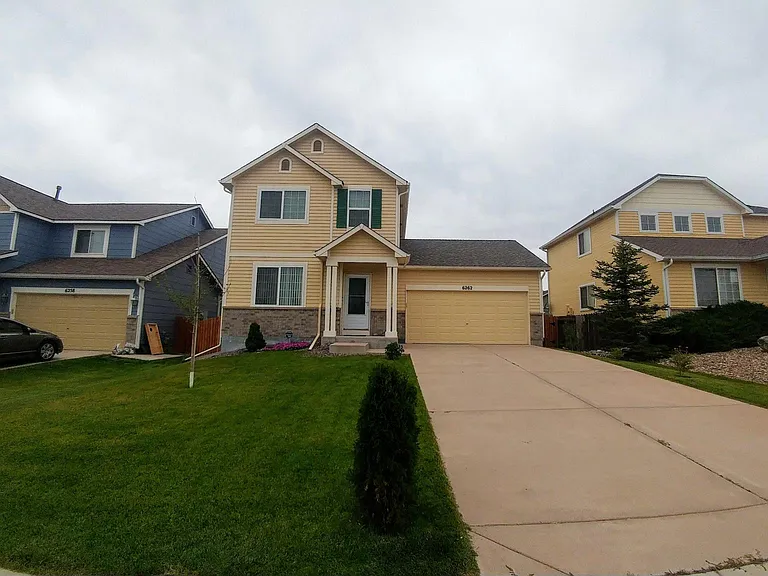 6262 Poudre Way — Photo 1
