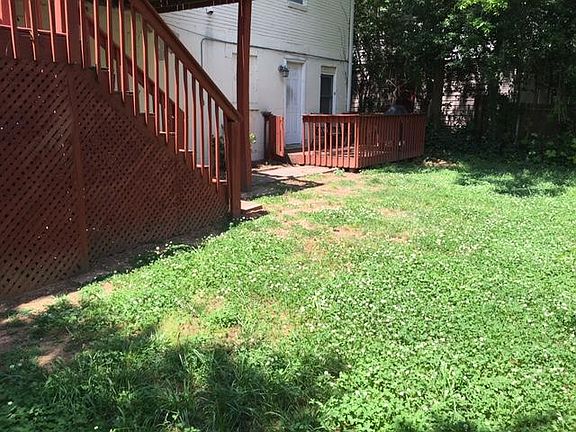 Back Yard and Private Deck and Rear Entrance