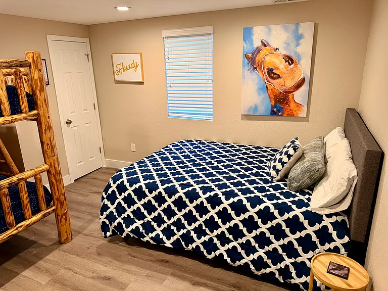 Bunk room with queen bed