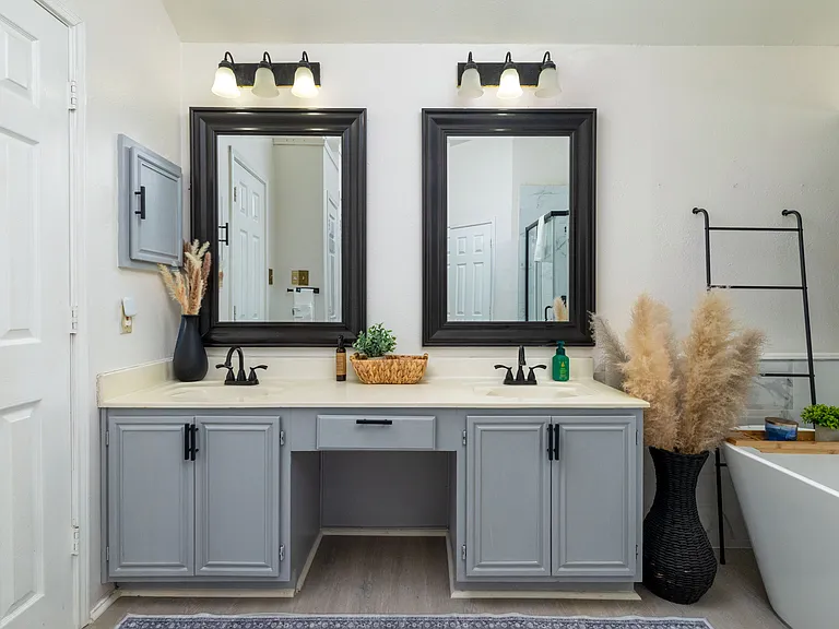 Spacious spa-like master bath with double vanity and soaking tub.