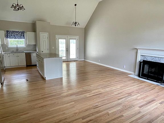 Upgraded living room, new granite countertop, new hardwood floor