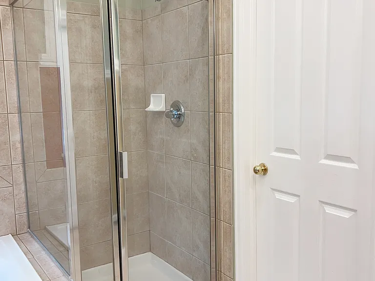 Master bathroom - alternate view of walk-in shower and separate 
rest room
