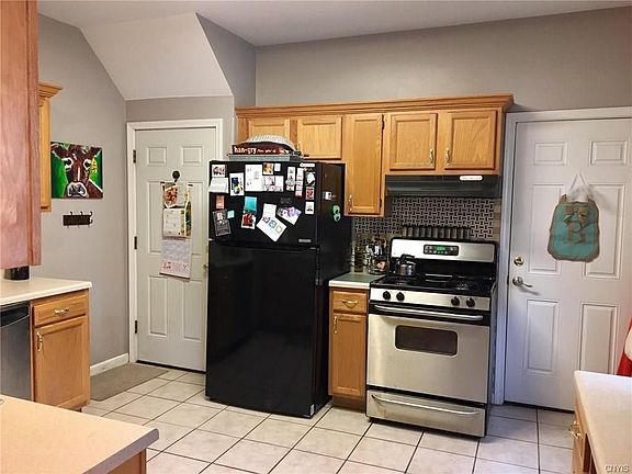 Refrigerator replaced with new stainless steel fridge.