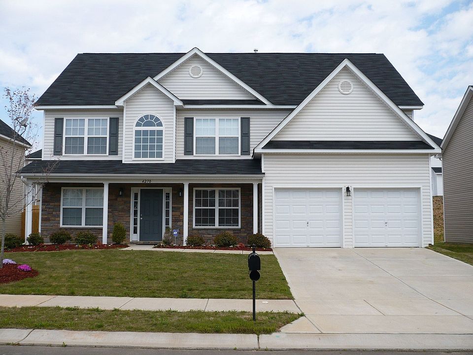 Stacked Stone & Vinyl Exterior