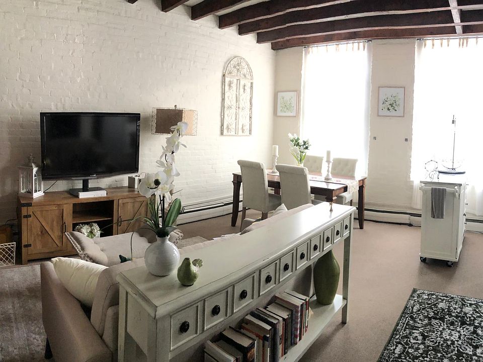 Entry and main living area featuring the living room and dining area