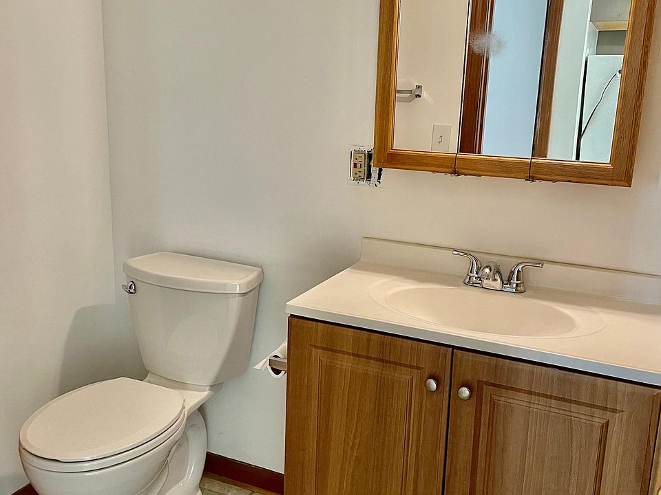 bathroom with tub/shower combo and large storage closet