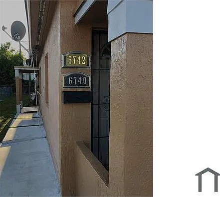 6740 NW 6th Ct — Photo 2