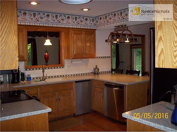 Kitchen with opening into sunroom