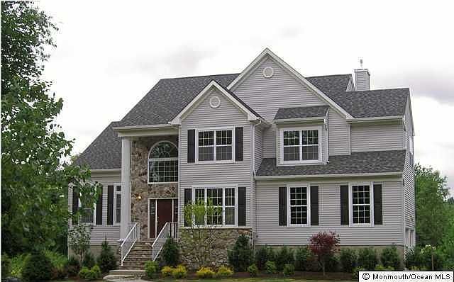 GORGEOUS STONE & VINYL FRONT, 2 CAR SIDE ENTRY GARAGE, PROFESSIONAL LANDSCAPE