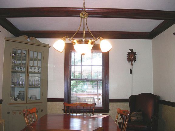 dining room with beamed ceiling