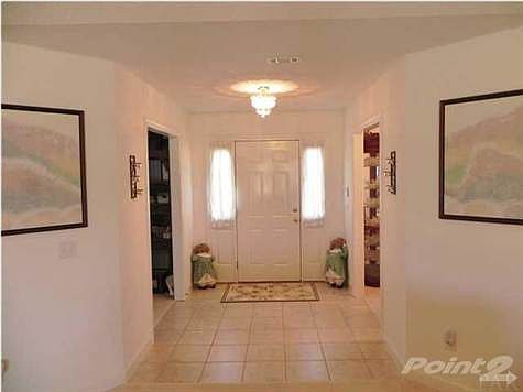 View of front entrance of the house while standing in the Great room. BonusRoom/Office is to your le